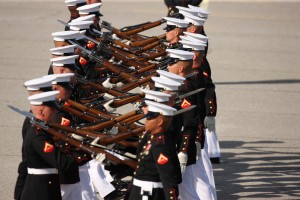 U.S. Marine Corps Silent Drill Platoon performs a routine on Peatross Parade Deck 