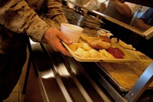 A recruit from Fox Company, 2nd Recruit Training Battalion, grabs a dessert.  (Photo by Lance Cpl. David Bessey)