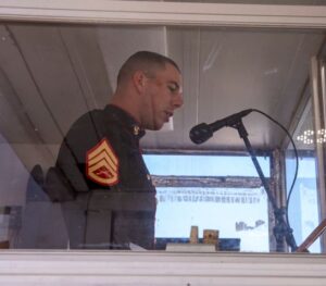 Staff Sgt. Mark Gulotta,, narrates a recruit graduation on Marine Corps Recruit Depot, Parris Island, S.C. Gulotta completed his first graduation ceremony on February 25. (U.S. Marine Corps photo by Lance Cpl. Michelle Brudnicki)