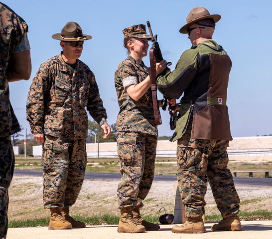 Marines with Weapons and Field Training Battalion hold a ribbon cutting ceremony for the re-opening of Hue-City Range. (U.S. Marine Corps photo by Lance Cpl. Michelle Brudnicki)