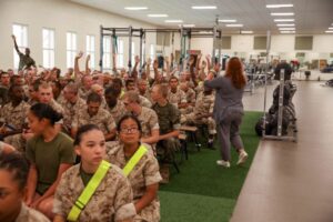 Life Skills Program Trainer Sarhi Wiggins with Marine Corps Community Services gives a class to recruits of Romeo Company. (U.S. Marine Corps Photo by Sgt. Ryan Hageali)